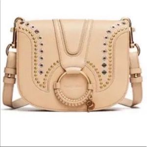 See by Chloe tan cross body bag studded.